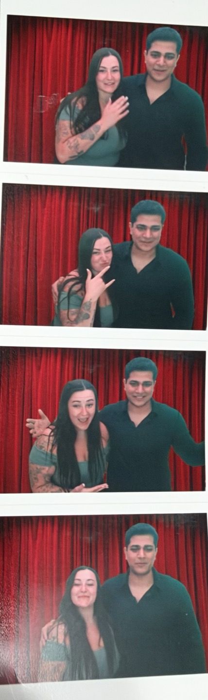 Our candid photo-booth pictures against red curtains